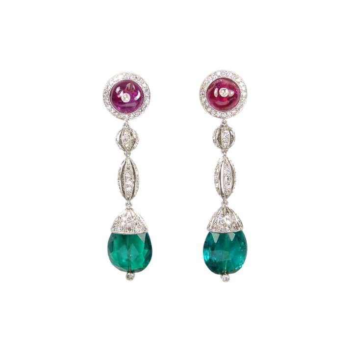 Pair of facetted emerald drop, ruby and diamond pendant earrings, each hung with a pear shaped briolette Colombian emerald, 5.05ct and 4.65ct,